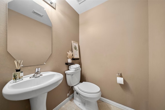 15015 Cozy Hollow Ln, Houston, TX 77044 - bathroom featuring baseboards and tile patterned floors
