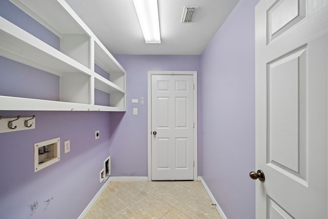 15015 Cozy Hollow Ln, Houston, TX 77044 - laundry room with electric dryer hookup, washer hookup, and light tile patterned floors