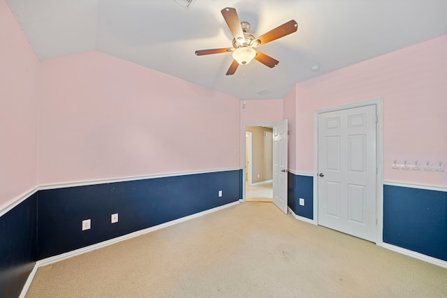 15015 Cozy Hollow Ln, Houston, TX 77044 - unfurnished bedroom with light colored carpet, ceiling fan, and lofted ceiling