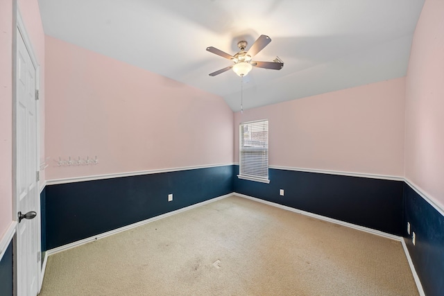 15015 Cozy Hollow Ln, Houston, TX 77044 - spare room featuring carpet floors, ceiling fan, and vaulted ceiling