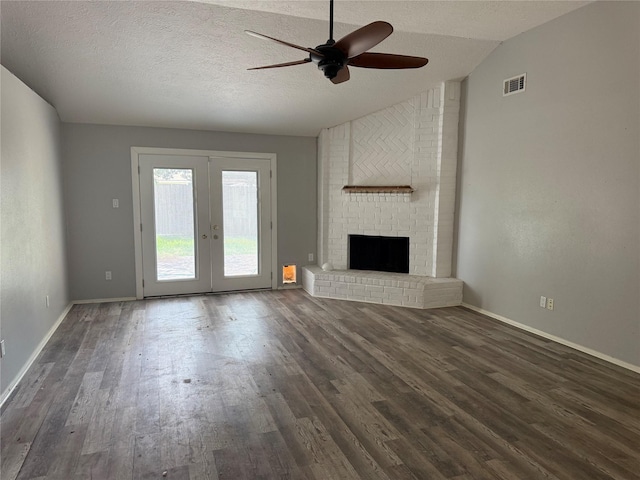 4706 Owens Creek Ln, Spring, TX 77388 - unfurnished living room featuring ceiling fan, wood finished floors, lofted ceiling, french doors, and a textured ceiling