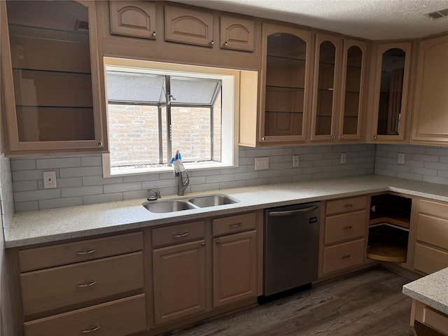 4706 Owens Creek Ln, Spring, TX 77388 - kitchen featuring stainless steel dishwasher, dark wood finished floors, backsplash, glass insert cabinets, and a textured ceiling