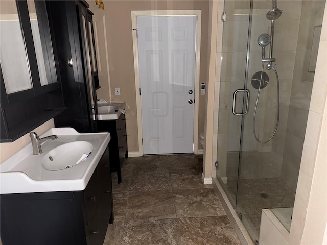 4706 Owens Creek Ln, Spring, TX 77388 - full bath featuring a stall shower, vanity, and stone finish flooring