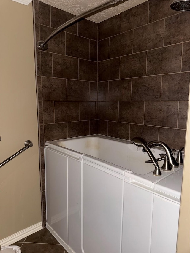 4706 Owens Creek Ln, Spring, TX 77388 - bathroom featuring tile patterned floors and baseboards