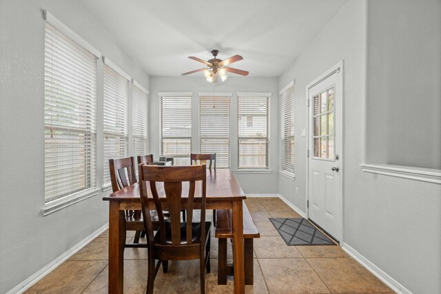 14402 Hazeldale Dr, Cypress, TX 77429 - dining space featuring plenty of natural light, a ceiling fan, and light tile patterned floors