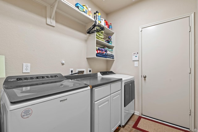 14402 Hazeldale Dr, Cypress, TX 77429 - laundry area featuring washing machine and clothes dryer and cabinet space