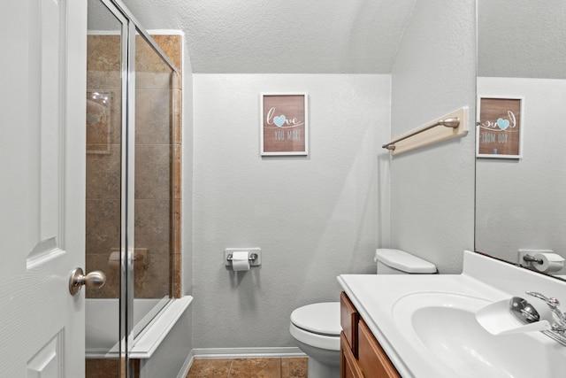 14402 Hazeldale Dr, Cypress, TX 77429 - full bath with vanity, tile patterned floors, and bath / shower combo with glass door