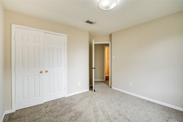 107 Mango St, Lake Jackson, TX 77566 - unfurnished bedroom with carpet and a closet