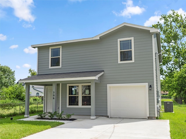306 N Orange St, Sweeny, TX 77480 - traditional-style home with an attached garage, covered porch, a front yard, and concrete driveway