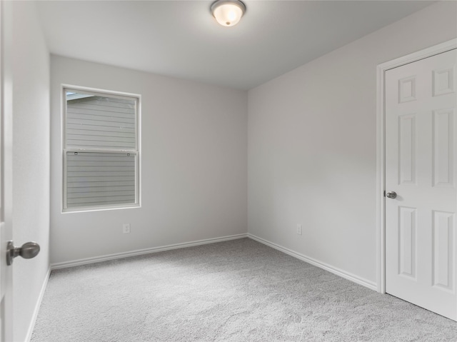 306 N Orange St, Sweeny, TX 77480 - carpeted spare room with baseboards