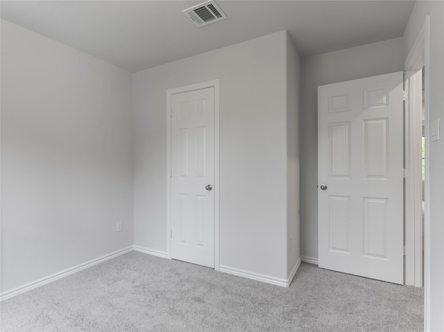 306 N Orange St, Sweeny, TX 77480 - unfurnished bedroom with carpet floors and baseboards