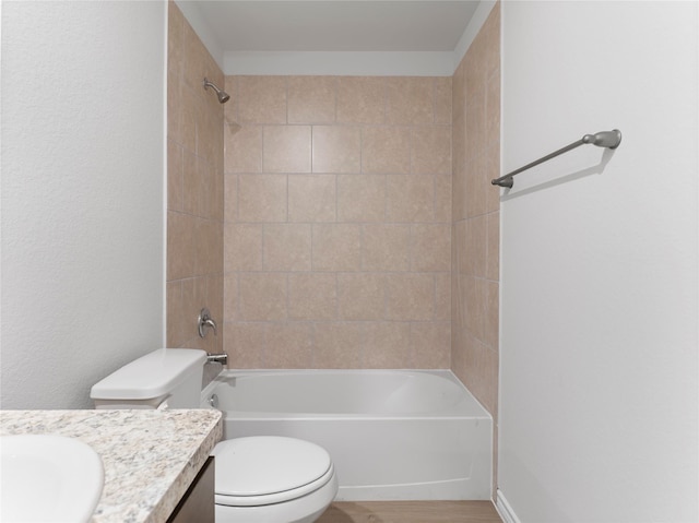 306 N Orange St, Sweeny, TX 77480 - bathroom featuring vanity,  shower combination, and wood finished floors
