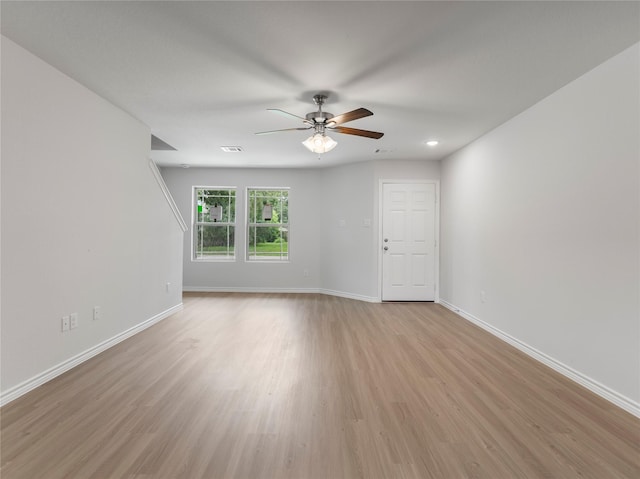 306 N Orange St, Sweeny, TX 77480 - unfurnished room featuring ceiling fan and light wood-type flooring