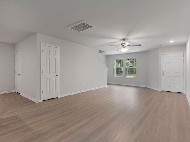 306 N Orange St, Sweeny, TX 77480 - unfurnished living room featuring ceiling fan, light wood-type flooring, and recessed lighting