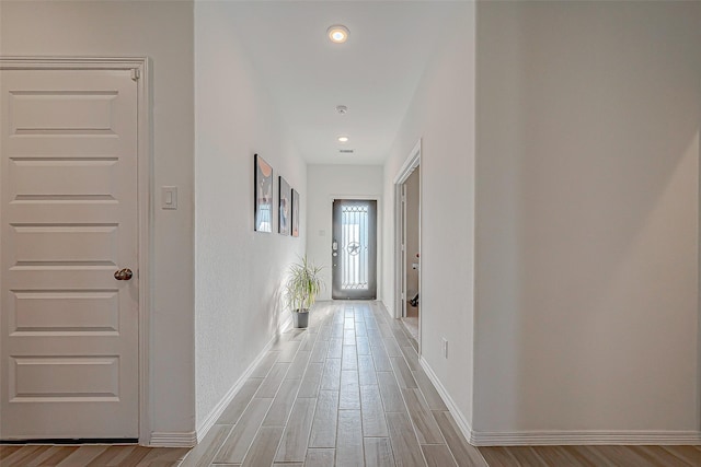 5703 Morning Vista Rd, Katy, TX 77493 - hallway featuring light wood finished floors and recessed lighting