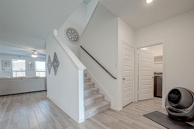 5703 Morning Vista Rd, Katy, TX 77493 - staircase featuring wood finished floors and ceiling fan