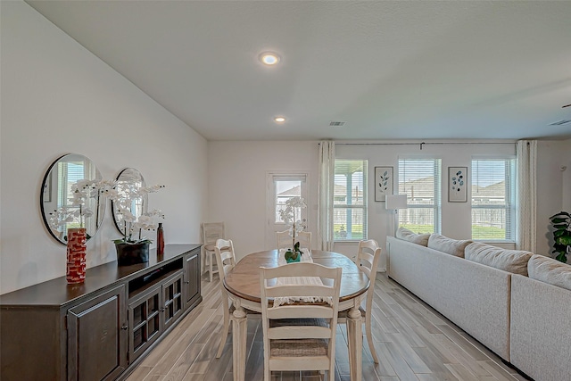 5703 Morning Vista Rd, Katy, TX 77493 - dining space with wood tiled floors and recessed lighting
