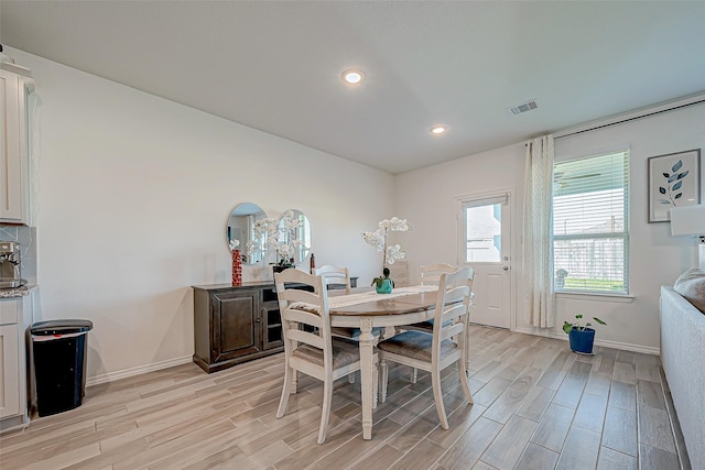 5703 Morning Vista Rd, Katy, TX 77493 - dining area featuring light wood-style flooring and recessed lighting