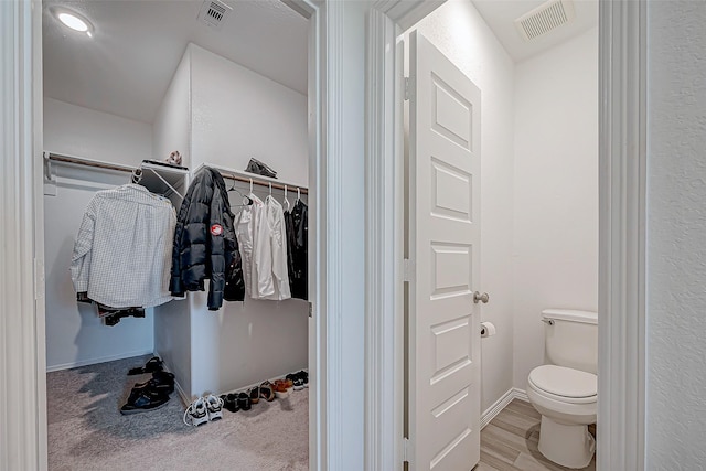 5703 Morning Vista Rd, Katy, TX 77493 - bathroom featuring toilet and a walk in closet