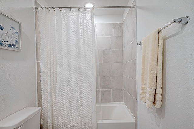 5703 Morning Vista Rd, Katy, TX 77493 - bathroom featuring shower / bathtub combination with curtain and toilet