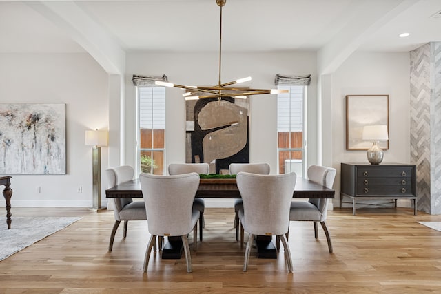 919 Worthshire St, Houston, TX 77008 - dining space featuring a chandelier and light wood-type flooring