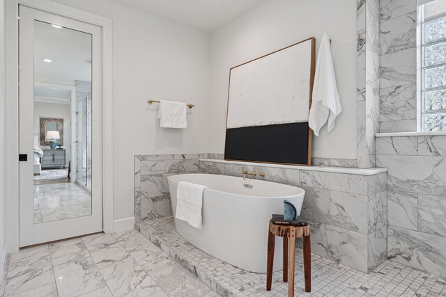 919 Worthshire St, Houston, TX 77008 - bathroom with marble finish flooring, healthy amount of natural light, a freestanding bath, a marble finish shower, and recessed lighting