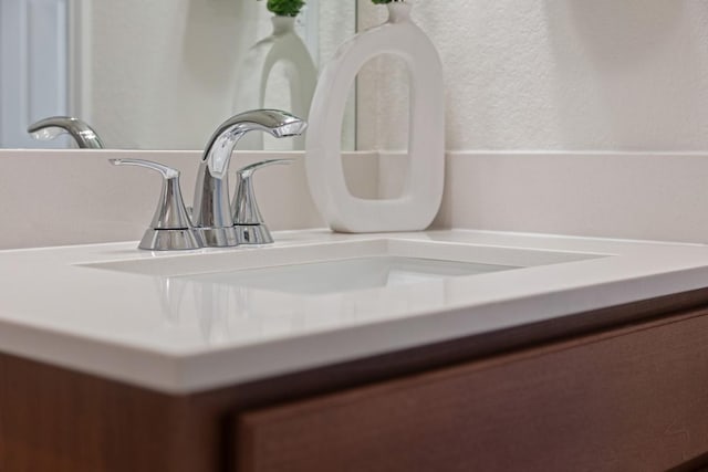 21115 Montego Bay Dr, Cypress, TX 77433 - bathroom view of vanity and a textured wall