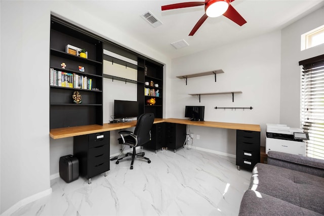4306 Dalea Clover Ln, Manvel, TX 77578 - home office with a ceiling fan, built in desk, and light marble finish floors