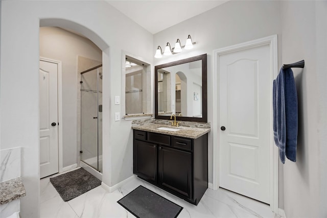 4306 Dalea Clover Ln, Manvel, TX 77578 - bathroom featuring vanity, a stall shower, and marble look tiles
