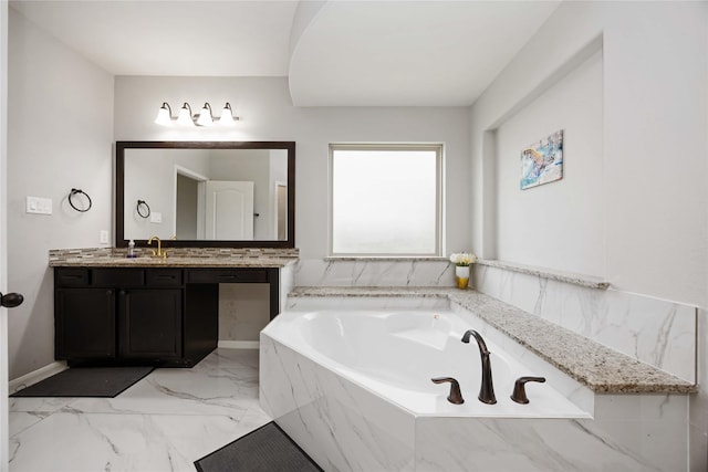 4306 Dalea Clover Ln, Manvel, TX 77578 - bathroom with vanity, a garden tub, and marble finish flooring