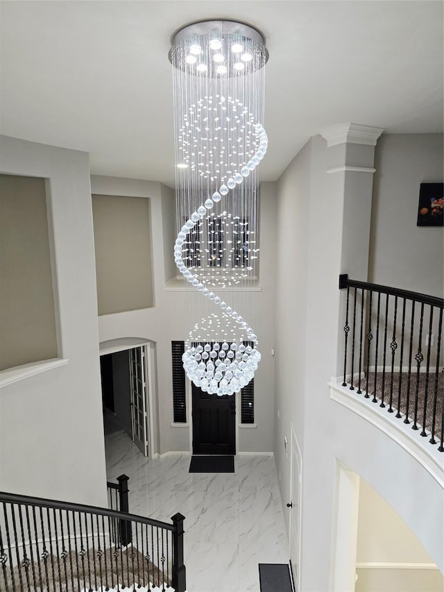 4306 Dalea Clover Ln, Manvel, TX 77578 - staircase with a chandelier and marble finish flooring