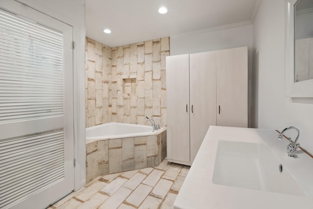 4018 Shady Springs Dr, Seabrook, TX 77586 - bathroom with tiled tub, ornamental molding, and recessed lighting