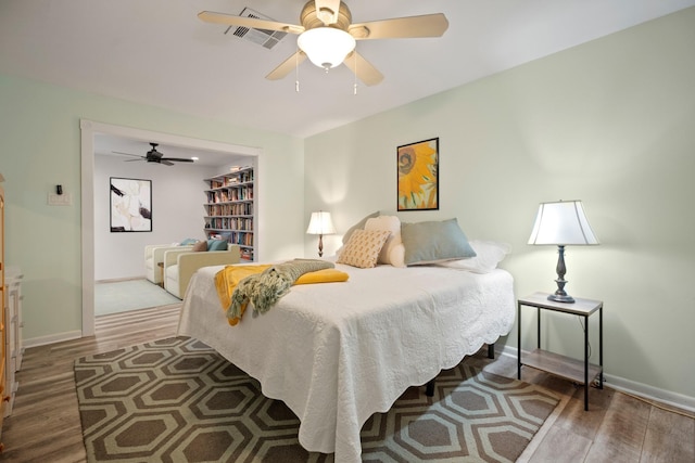 4018 Shady Springs Dr, Seabrook, TX 77586 - bedroom featuring wood finished floors and ceiling fan
