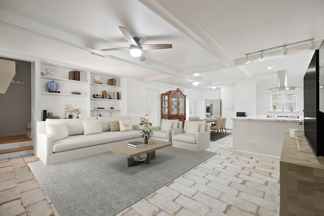 4018 Shady Springs Dr, Seabrook, TX 77586 - living room featuring a ceiling fan and beam ceiling
