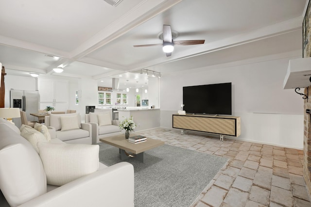 4018 Shady Springs Dr, Seabrook, TX 77586 - living area with stone tile floors, a ceiling fan, and beam ceiling