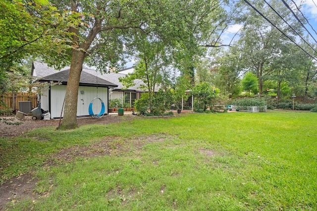 4018 Shady Springs Dr, Seabrook, TX 77586 - view of yard featuring a storage unit