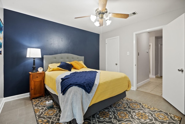 4018 Shady Springs Dr, Seabrook, TX 77586 - bedroom featuring light tile patterned flooring and ceiling fan