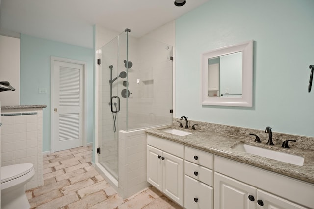 4018 Shady Springs Dr, Seabrook, TX 77586 - bathroom with a stall shower and double vanity