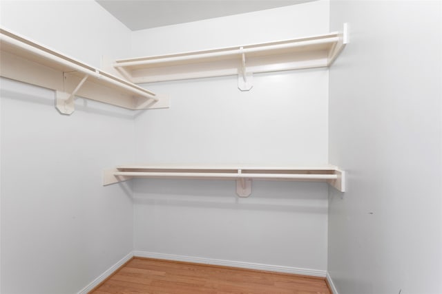 4311 Pebble Beach Dr, League City, TX 77573 - spacious closet with wood finished floors