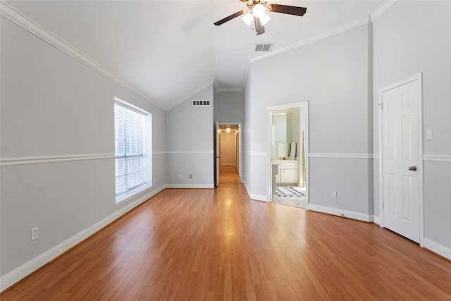 4311 Pebble Beach Dr, League City, TX 77573 - empty room with a ceiling fan, light wood-style floors, crown molding, and high vaulted ceiling