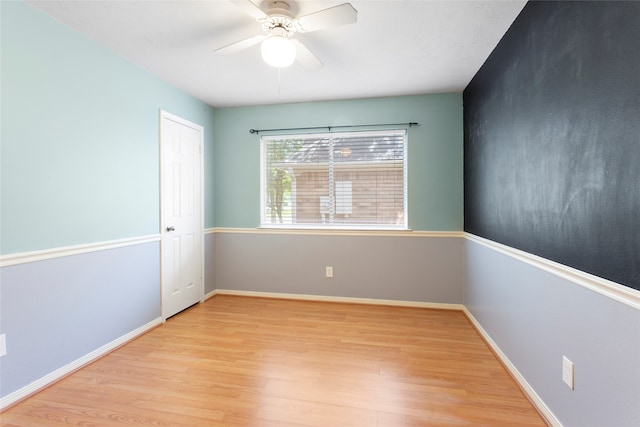 4311 Pebble Beach Dr, League City, TX 77573 - unfurnished room featuring light wood-style flooring and a ceiling fan