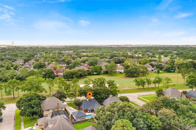 4311 Pebble Beach Dr, League City, TX 77573 - aerial perspective of suburban area featuring a tree filled landscape