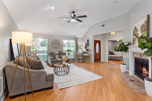 4311 Pebble Beach Dr, League City, TX 77573 - living area with a fireplace, a ceiling fan, vaulted ceiling, wood finished floors, and recessed lighting