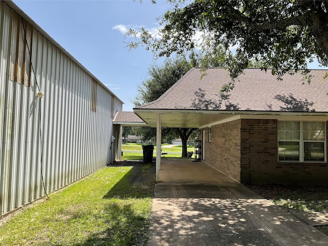 30 Piper Ln, Normangee, TX 77871 - view of grassy yard with an attached carport and driveway