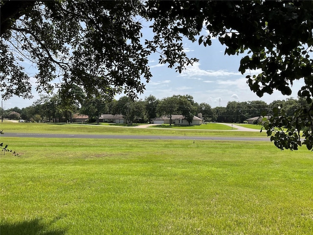 30 Piper Ln, Normangee, TX 77871 - surrounding community with a lawn