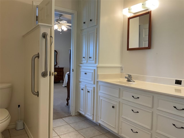30 Piper Ln, Normangee, TX 77871 - bathroom with tile patterned floors, vanity, and ceiling fan