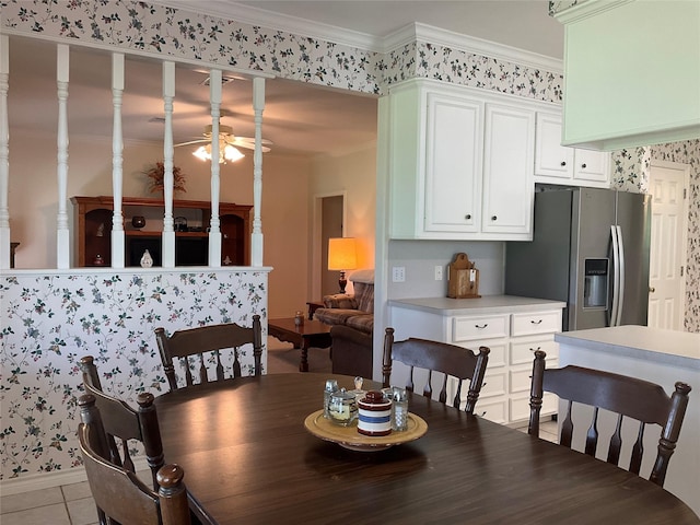 30 Piper Ln, Normangee, TX 77871 - dining area featuring crown molding, ceiling fan, wallpapered walls, and light tile patterned flooring