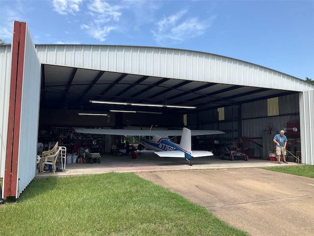 30 Piper Ln, Normangee, TX 77871 - view of parking with an outbuilding and a garage
