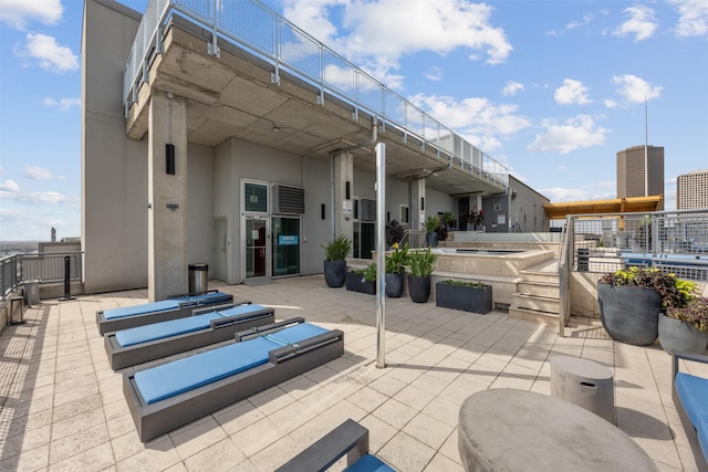 2000 Bagby St Unit 7414, Houston, TX 77002 - view of patio featuring a hot tub