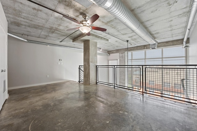 2000 Bagby St Unit 7414, Houston, TX 77002 - garage featuring ceiling fan and baseboards